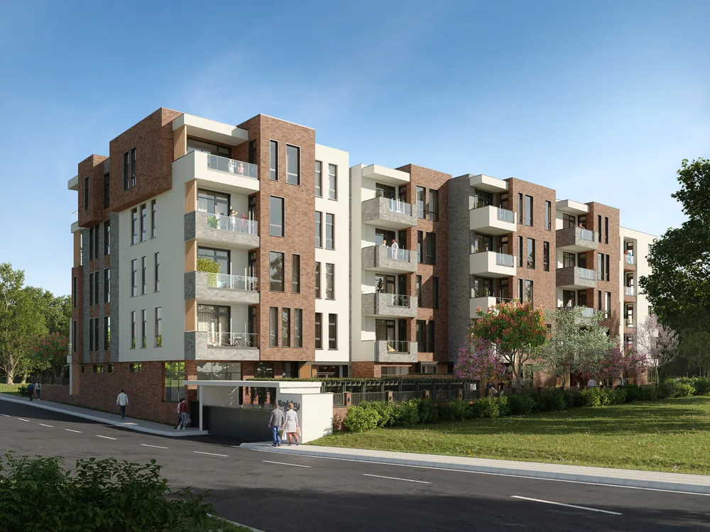 Street view of the residential building in Pleven, with brick facades and glass balconies